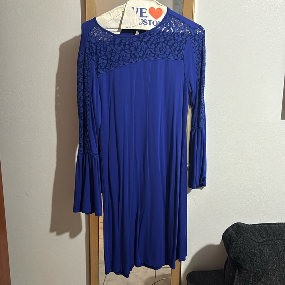 Beautiful purple dress with lace and bell sleeves